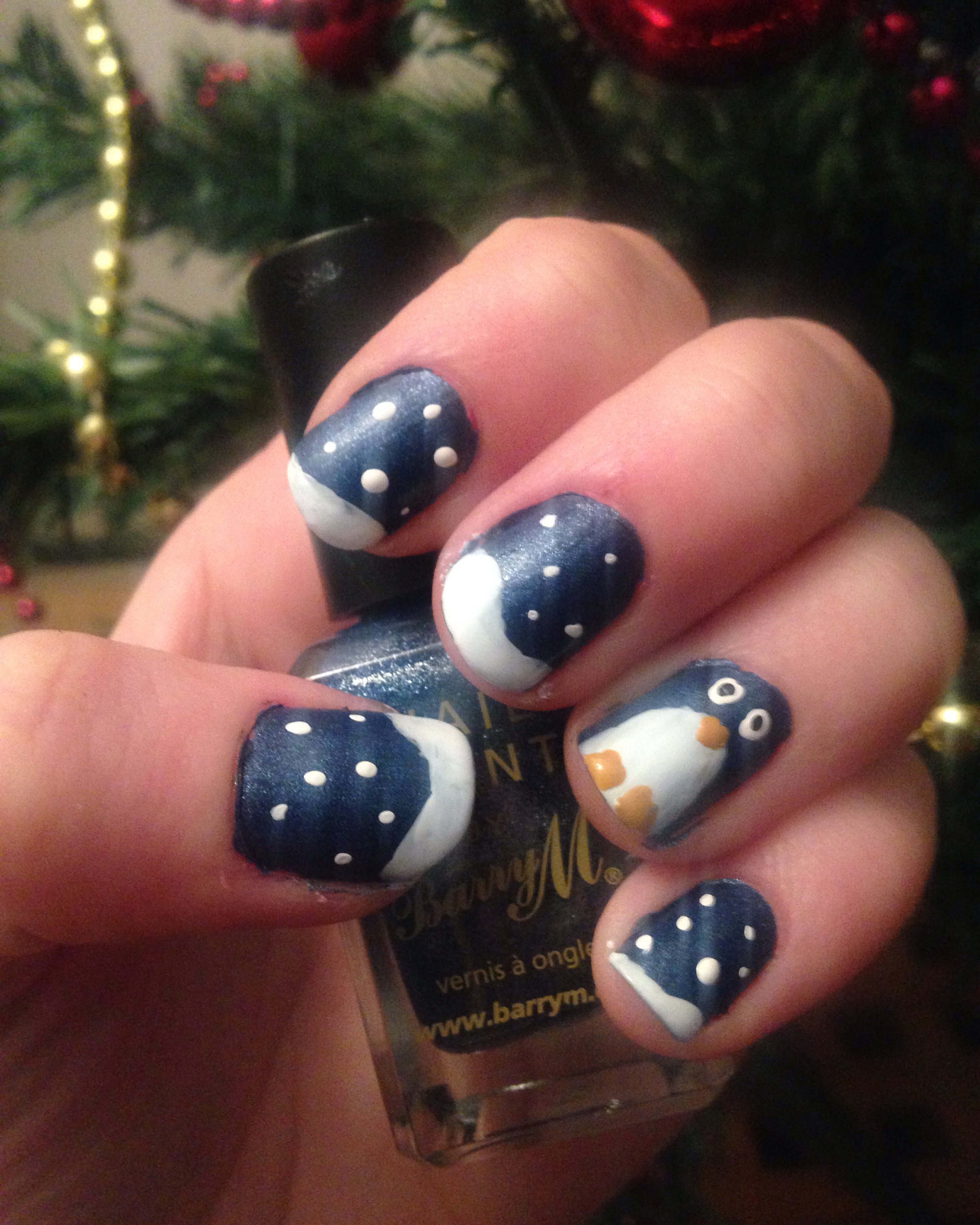 Winter nail art is always fun. I love this cute little penguin!
